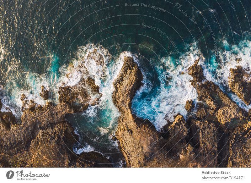 Drone view of coast with cliffs Coast Cliff Waves drone view Rock Splashing Remote Aircraft foamy Day Spain Tenerife Water Height Ocean Landscape Nature