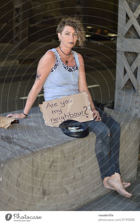 Begging punk sits under bridge with sign ARE YOU MY NEIGHBOUR ? Alcoholic drinks Money Intoxicant Unemployment Woman Adults Subculture Punk Bridge Street Tattoo