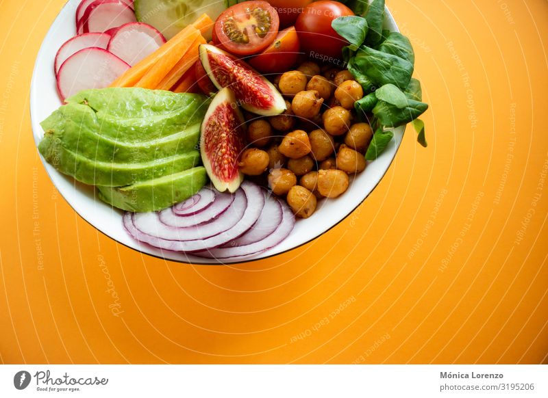 Buddha bowl wirh avocado, figs, chickpeas and carrot. Vegetable Diet Bowl Fresh egg healthy Copy Space Fig wood cucumber Seasons Spinach Meal buddha bowl Salad