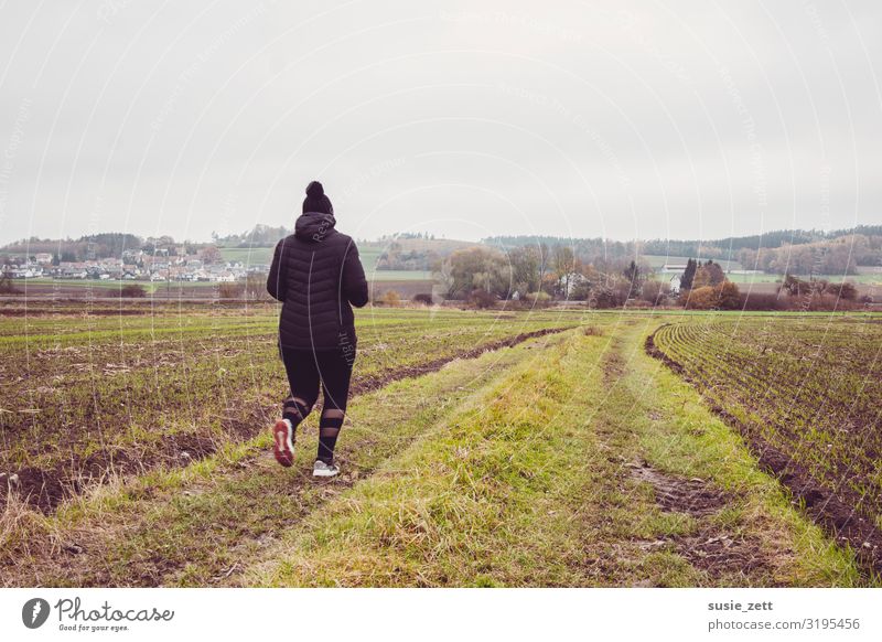 Curvy woman jogging along a country lane Healthy Fitness Leisure and hobbies Far-off places Sports Sports Training Jogging Feminine Young woman