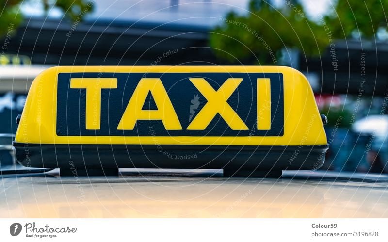 Taxi sign Business Taxi rank Downtown Passenger traffic Road traffic Motoring Car Vacation & Travel Yellow Black City Europe Germany Information taxi sign