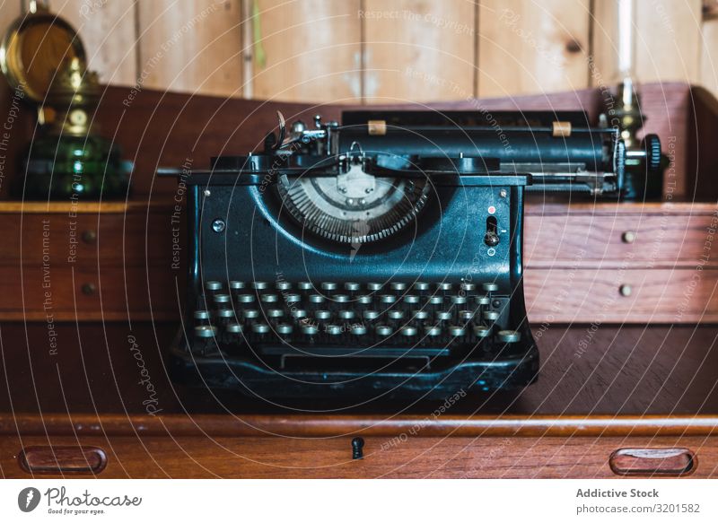 vintage typewriter in a wooden old furniture in a wooden room Typewriter Vintage Old Retro Antique Writer Keyboard machine Communication Object photography