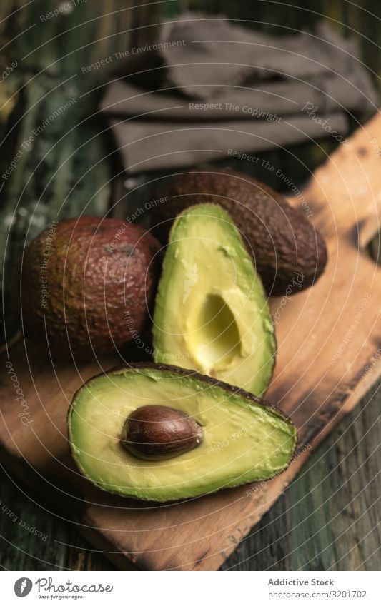 Set of freshly cut fresh avocados Avocado Cut Diet Exotic Food Fresh Fruit Green Half Healthy Natural Nature Nutrition Organic Raw Mature Seed Tropical