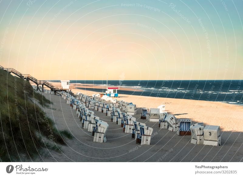 Beach landscape with wicker chairs in the morning on Sylt island Relaxation Vacation & Travel Summer Summer vacation Beautiful weather Coast North Sea Blue