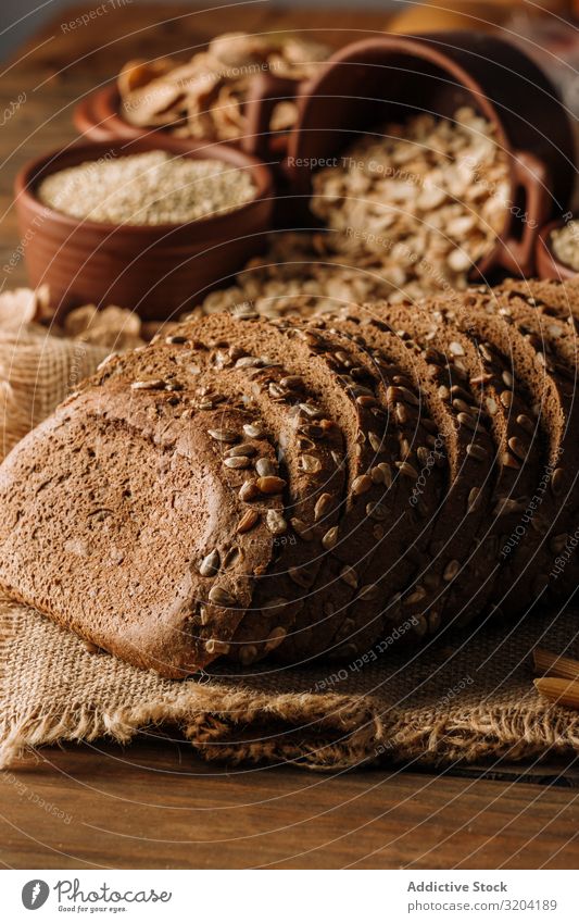 Freshly baked rye bread on napkin on table Horizontal Napkin Copy Space Delicious Culinary Cooking wholegrain Rustic Linen Organic Gourmet Ingredients Bakery