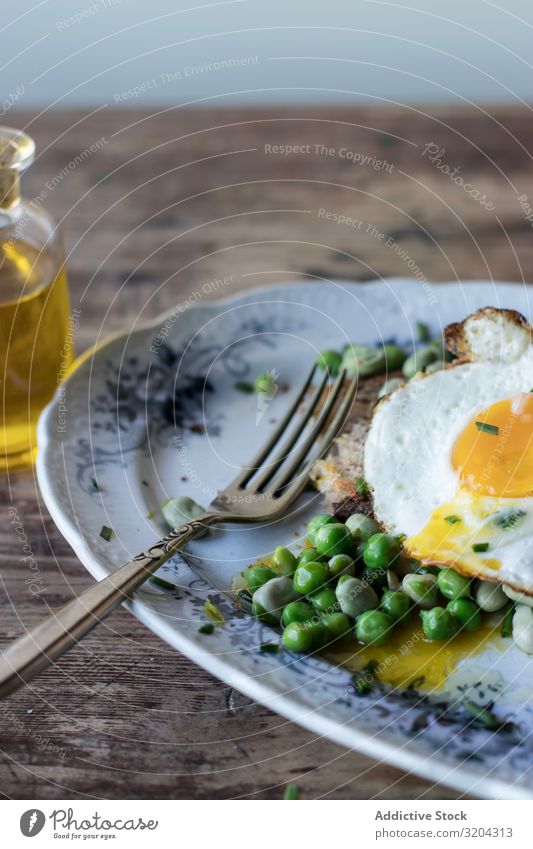 Delicious breakfast meal with steamed peas and egg Breakfast Peas Egg Frying sauteed served Eating Meal Beans Food Fresh Morning Cooking Tradition Edible
