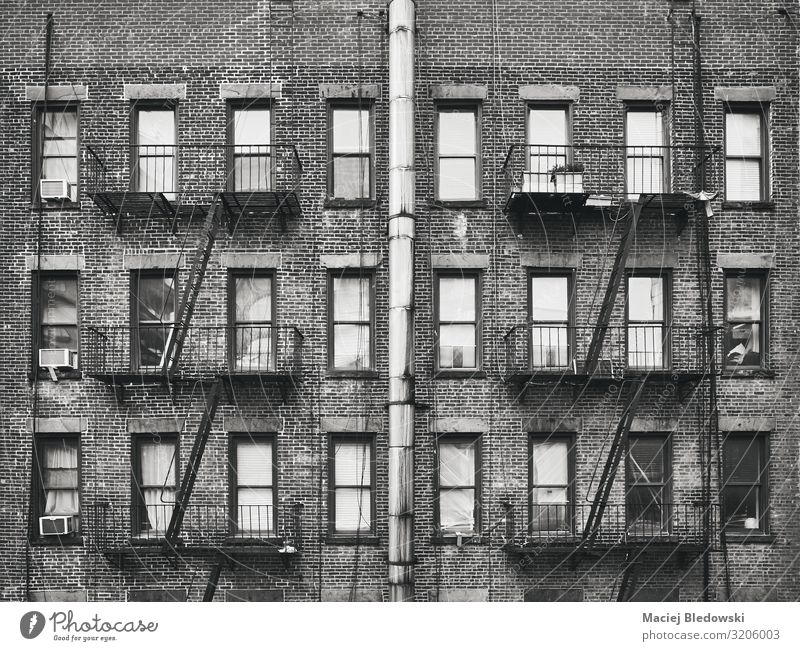 Old brick house with fire escapes, New York, USA. Lifestyle Living or residing Flat (apartment) House (Residential Structure) House building Building