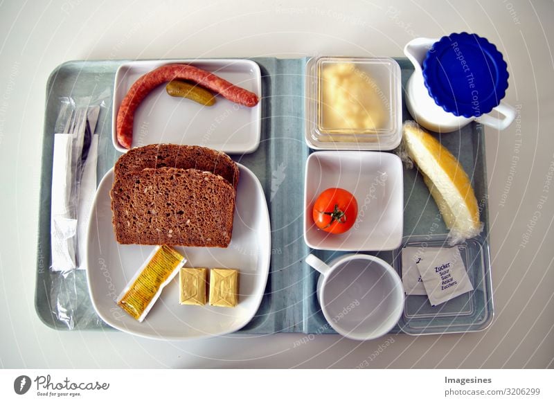 Hospital food Hospital food. Sparse food on a tray like in a canteen of hospitals, universities and similar places. Tray with a meal on a plate of hospital food. Sparse food for patients to prevent illness.