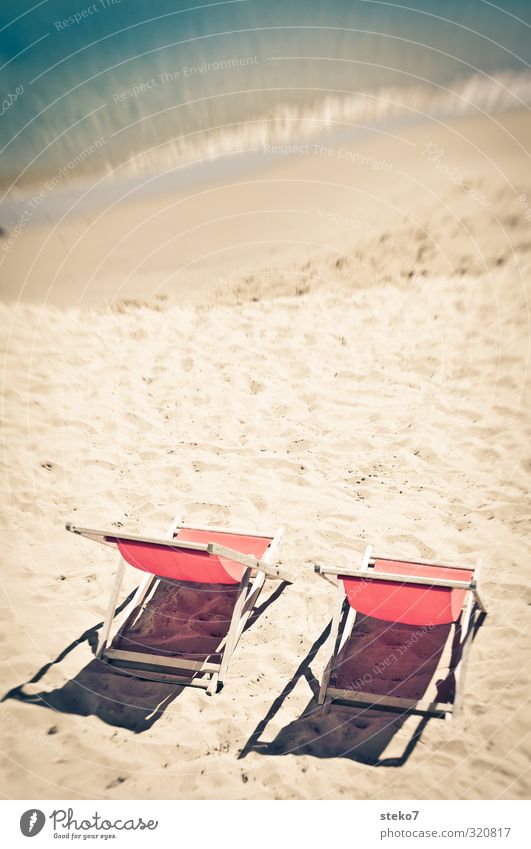 wait for the 2nd Advent Sun Waves Beach Ocean Relaxation Warmth Red Turquoise Calm Vacation & Travel Deckchair Empty Summer vacation Colour photo Exterior shot