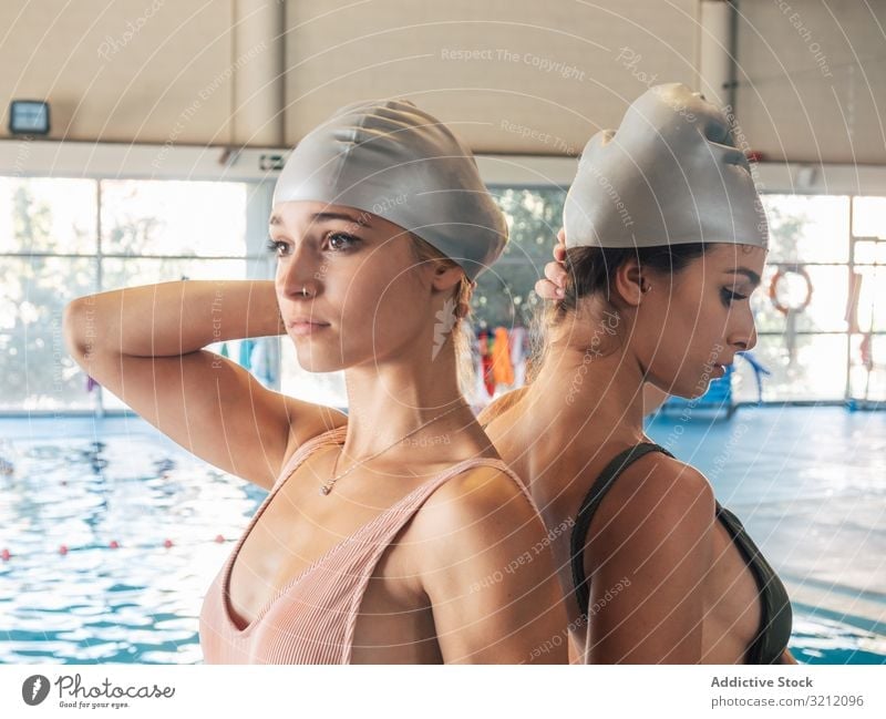 Young slim women in swimming pool - a Royalty Free Stock Photo from  Photocase