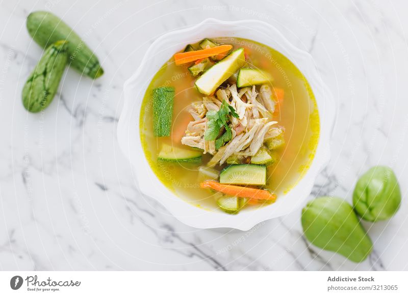 Served chicken soup with carrot and zucchini bowl delicious served food meal gourmet cuisine nutrition dinner vegetable plate tasty diet health dish culinary