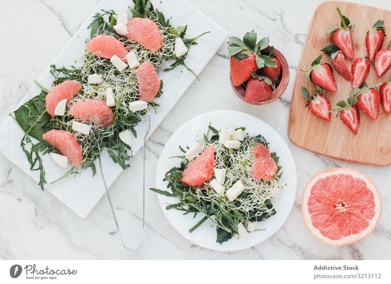 Strawberry, grapefruit and rocket salad on bowl strawberry almond greenery avocado delicious served food meal gourmet cuisine nutrition dinner spice vegetable