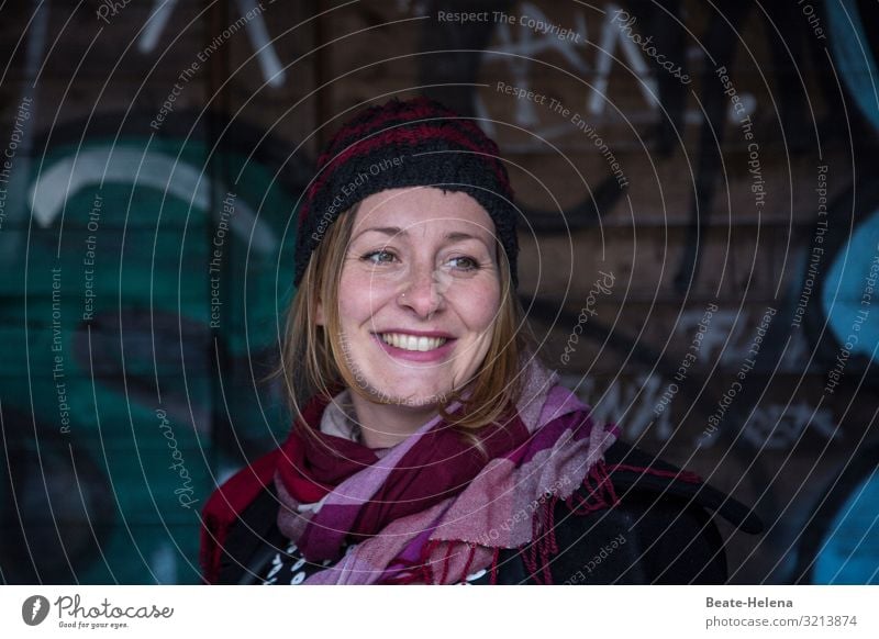 Joie de vivre 7 Joie de vivre (Vitality) Young woman pretty Smiling chill Cap Scarf Exterior shot portrait scribbling Contentment