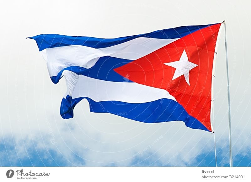 cuban flag waving under a cloudy sky II Lifestyle Vacation & Travel Tourism Trip Island Sky Clouds Places Street Sign Line Flag Old To enjoy Beautiful