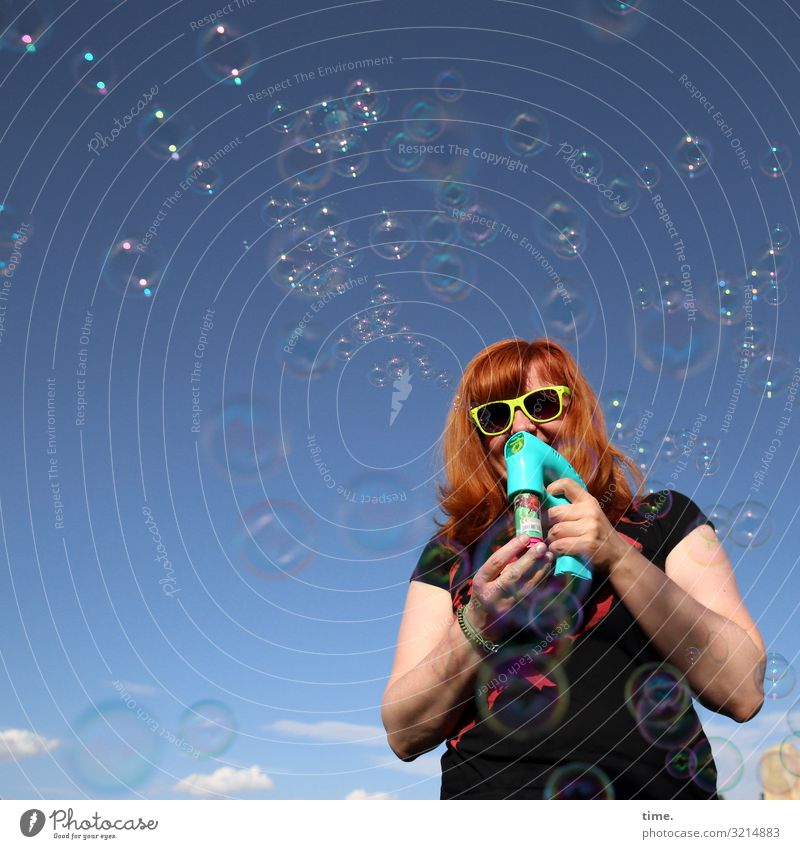 bubblemaker Feminine Woman Adults 1 Human being Sky Clouds Beautiful weather T-shirt Sunglasses Red-haired Long-haired Decoration Soap bubble Movement