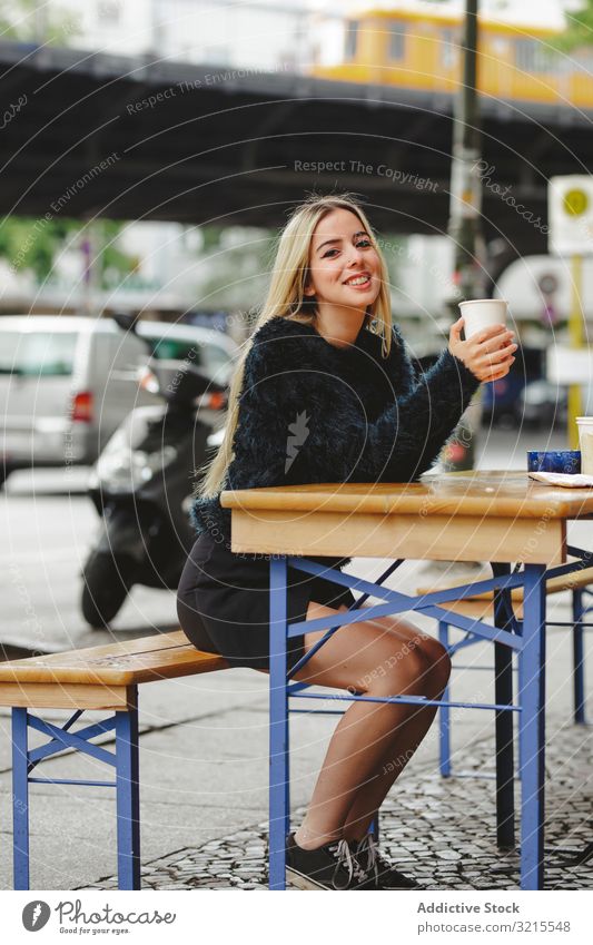 Female hipster in colorful clothes in countryside - a Royalty Free