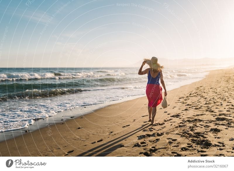 Bottom of two beautiful young women walking in swimwear Stock Photo by  davidpradoperucha