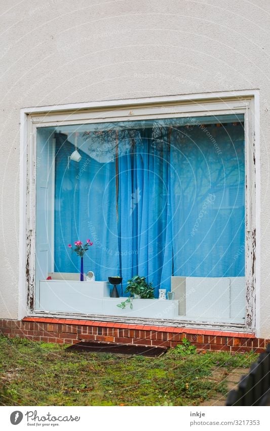 The window with the blue curtain Lifestyle Living or residing Flat (apartment) House (Residential Structure) Bad weather Meadow Deserted Facade Window
