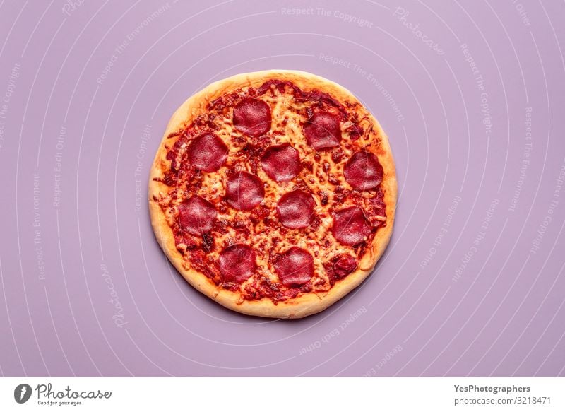 Whole Pizza Salami On Purple Background Homemade Pepperoni Pizza A Royalty Free Stock Photo From Photocase