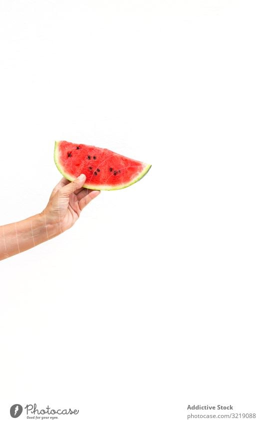 Crop hand with ripe watermelon juicy person fruit food fresh dessert diet vegetarian vegan vitamin sweet edible summer season organic delicious tasty yummy