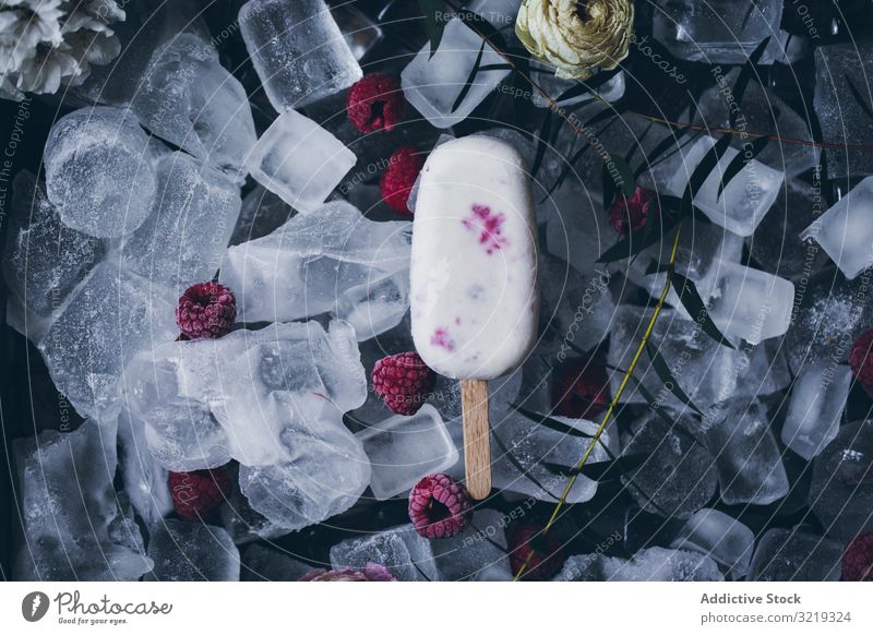 Creamy raspberry popsicle ice cream background white fruit summer lolly red colorful food stick sweet cold snack dessert refreshing sugar natural delicious