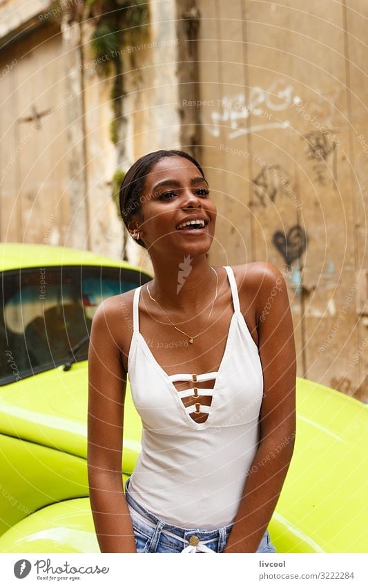 attractive young cuban woman , havana - cuba - a Royalty Free Stock Photo  from Photocase