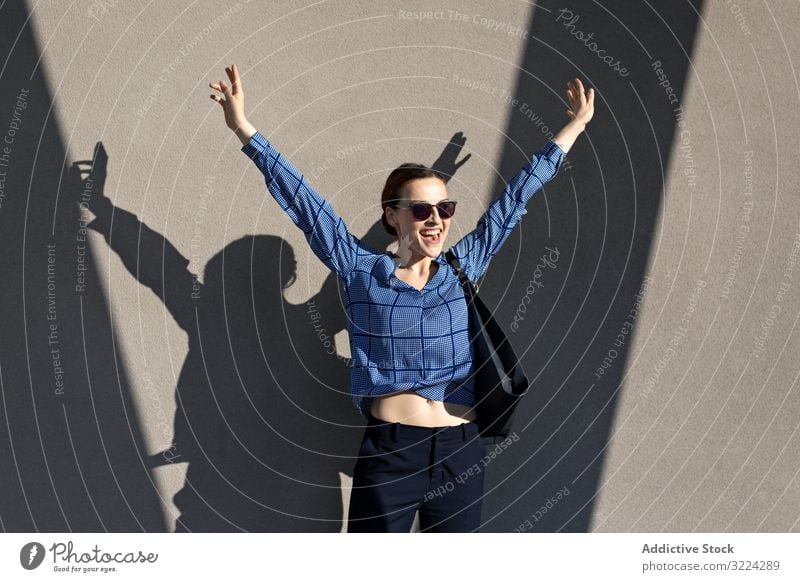 Athlete woman jumping and celebrating victory outdoors. - a