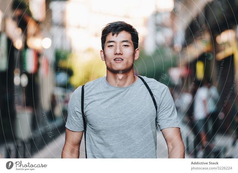 Smiling Man Walking Stock Photo - Download Image Now - Men, Asian and  Indian Ethnicities, Walking - iStock
