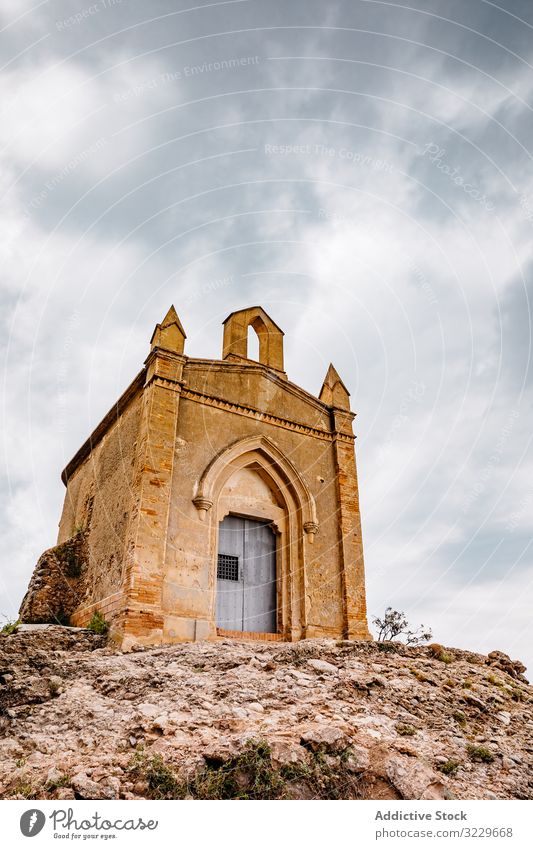 Hermitage of Sant Joan of the mountain of Montserrat hermit altitude outdoor traditional meditation medieval clouds spiritual rock nature stone landscape