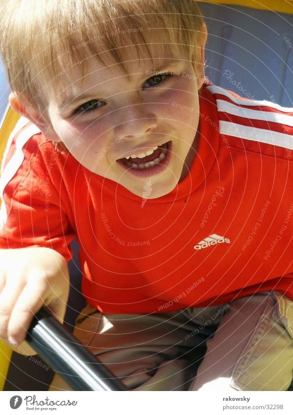 Child in a Schlauchbot Happiness Playing Dinghy Watercraft Summer Ocean Joy Events Boy (child) Sun Grinning Laughter Happy