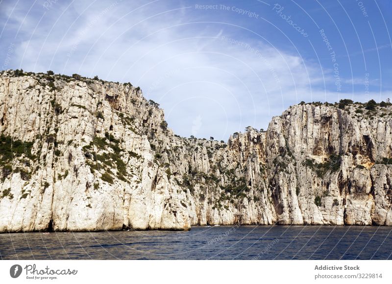 Beautiful white limestone rocks on seashore cliff landscape calanques massif france europe national park nature travel touristic attraction mountain water still