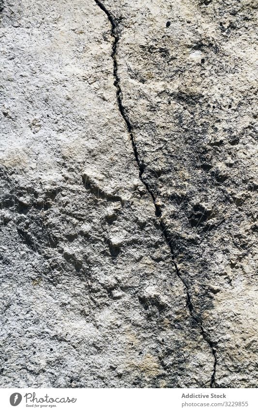 Texture of crack on old rocky surface texture mountain geology nature abstract formation crevice stone desert erosion canyon terrain curve shape fracture detail