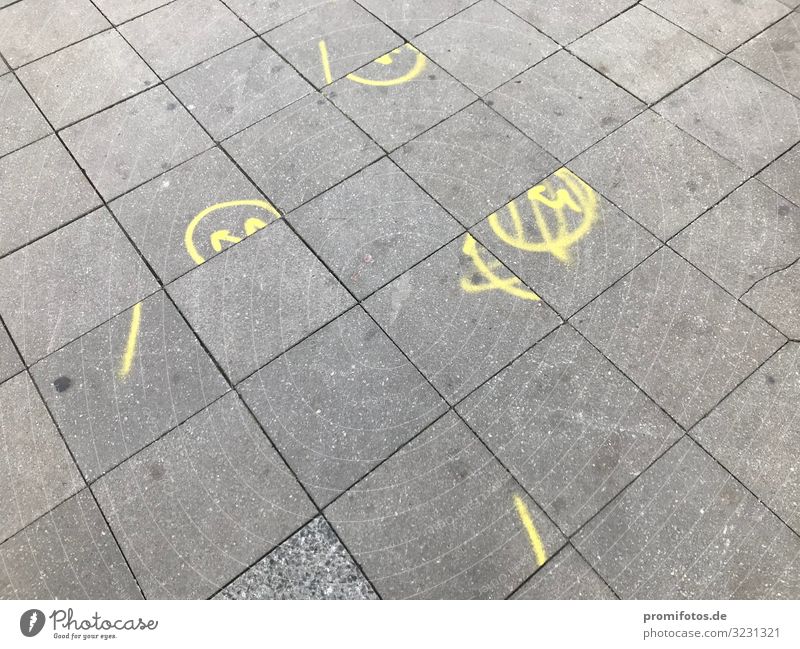 Puzzle with floor tiles. Photo: Alexander Hauk pedestrian shades Places Manmade structures Street Lanes & trails Stone Concrete Sign Characters Ornament Arrow