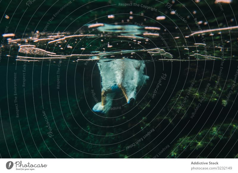 Diver surrounded by bubbles jumping in water swim underwater holiday playful active float sea energy action motion ocean seabed tourism recreation vacation