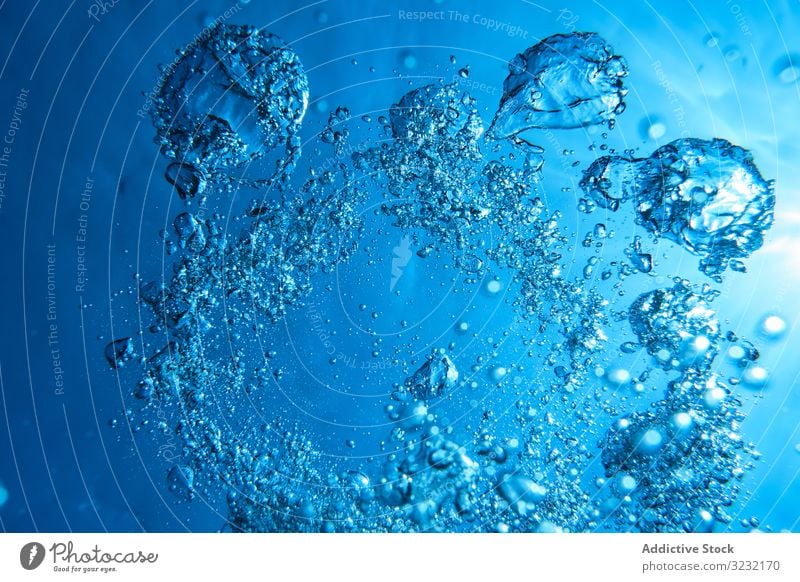 Popping up air bubbles in sea water background clear underwater clean oxygen purity breathe smooth motion fresh surface ocean transparent drop submerged dive