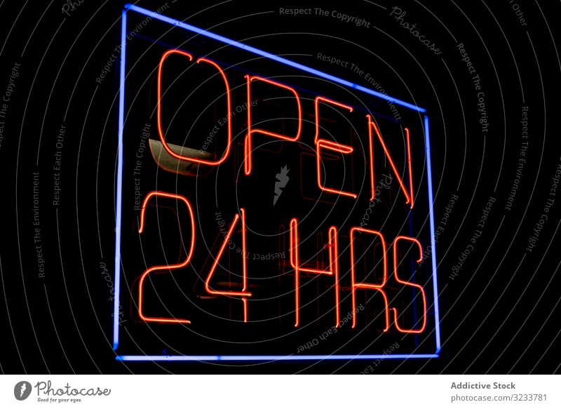 Neon sign open 24 hrs in dark night light neon letter illuminated fluorescent lamp signage public symbol bright words title neon sign night life advertisement