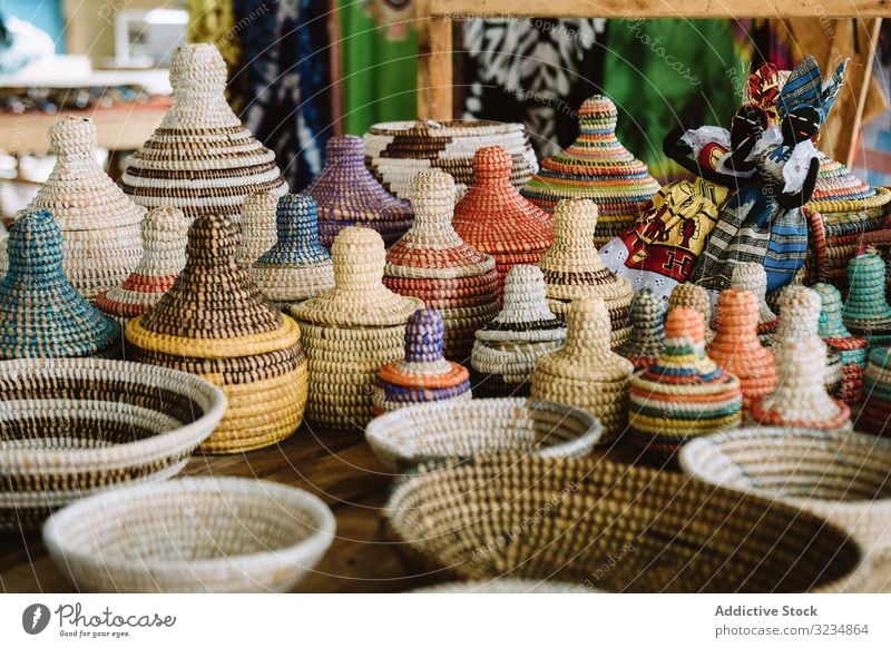 Wicker containers on market stall box wicker souvenir traditional bowl sell commerce street gambia organic natural lid retail store sale trade rural assortment