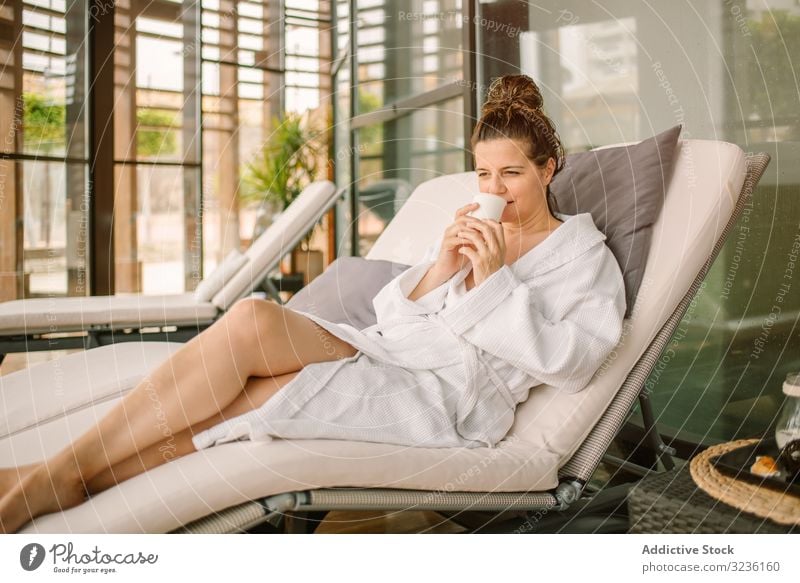 Content female relaxing in wellness center - a Royalty Free Stock Photo  from Photocase