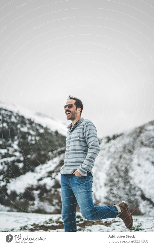 Man walking on winter field man snow relaxation enjoy country forest recreation alone meadow hill tree frozen quiet calm tranquil cold nature valley journey