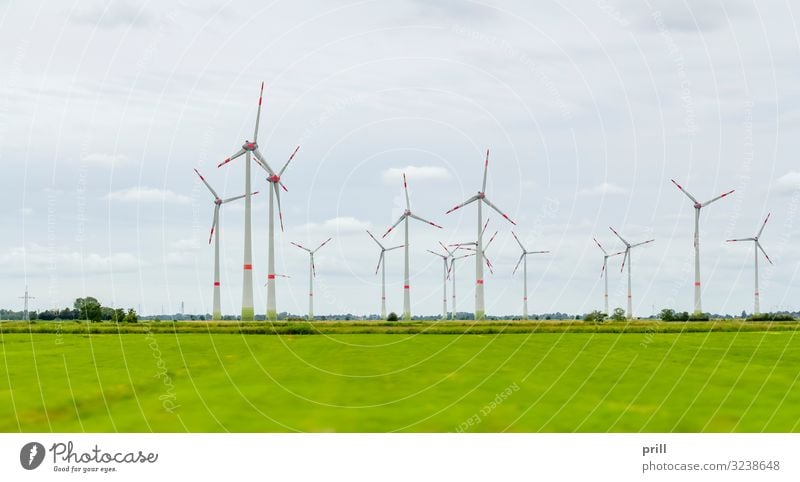 Wind farm in East Frisia Summer Flat (apartment) Wind energy plant Landscape Clouds Horizon Grass Meadow Coast Movement Innovative Sustainability East Frisland