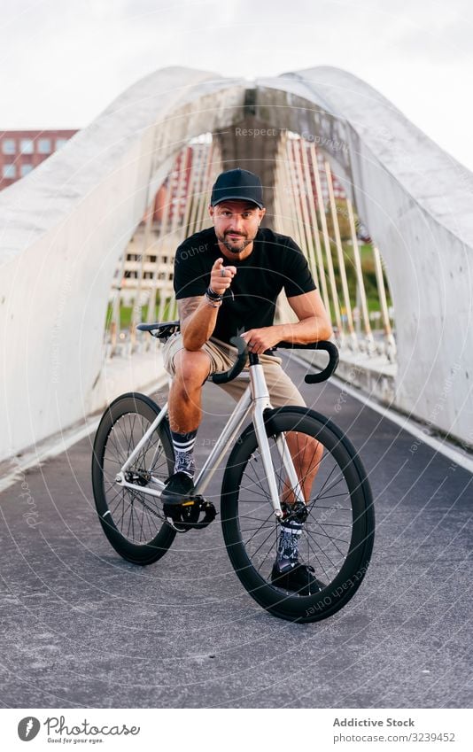 standing on a bike