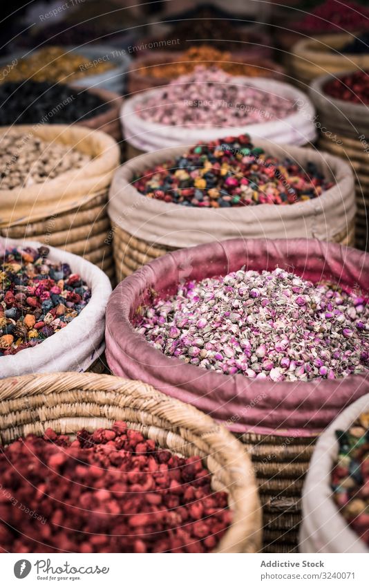 Baskets with dried spices on marketplace basket wicker herb sell traditional aroma marrakesh morocco bazaar arabic city town dry assortment powder trade street