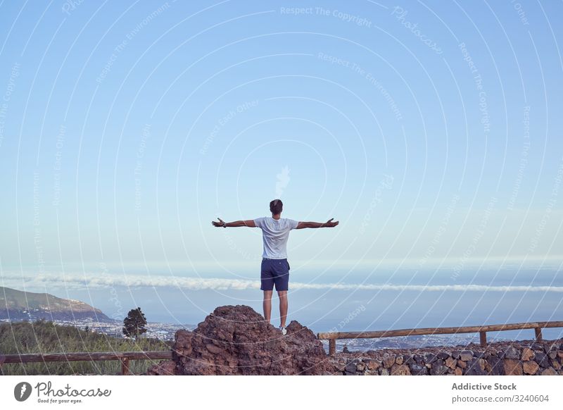 Man pointing away at majestic volcano man location direction island national park grand tenerife spain canary el teide scenic asphalt nature landscape tourism