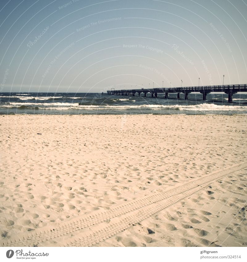 beach marks Elements Sand Water Sky Cloudless sky Horizon Beautiful weather Waves Coast Beach Baltic Sea Bridge Joy Sea bridge Ahlbeck Usedom Germany Skid marks