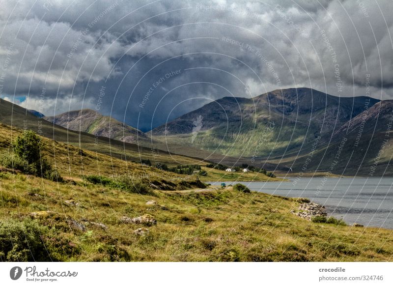 # 764 Scotland Highlands Isle of Skye Dark Weather Rain Clouds Threat Grass Nature Impressive Ocean Fjord House (Residential Structure)