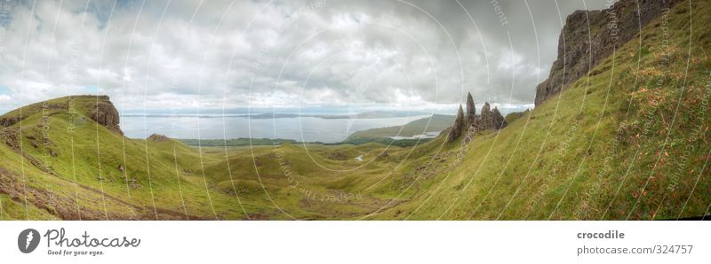 # 763 Old Man of Storr Scotland Hiking Rock Dark Grass Ocean Panorama (View) Panorama (Format) Vantage point Colour photo Subdued colour