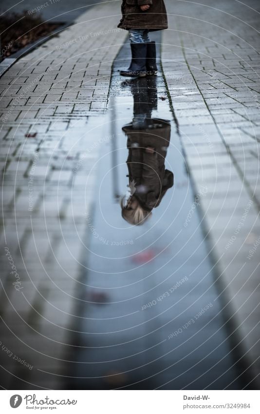 Child reflected in a puddle Mirror image reflection Infancy Future thoughts out Autumn Girl Playing Puddle Autumnal Rain Wet Bad weather Childhood memory