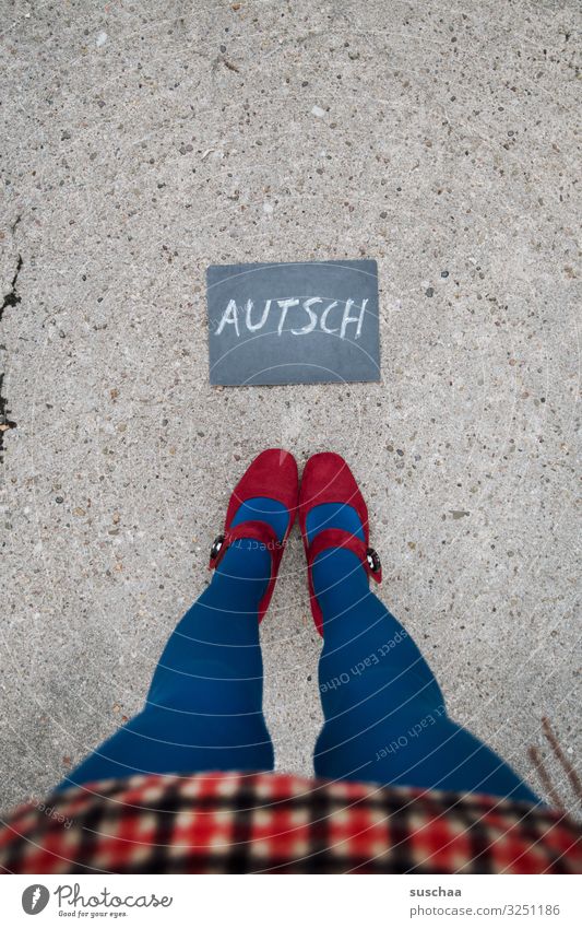 after the fall .. Text Word Letters (alphabet) Autsch Hurt Pain Blackboard Clue Information Communication Woman Legs Skirt feminine Street feet Asphalt