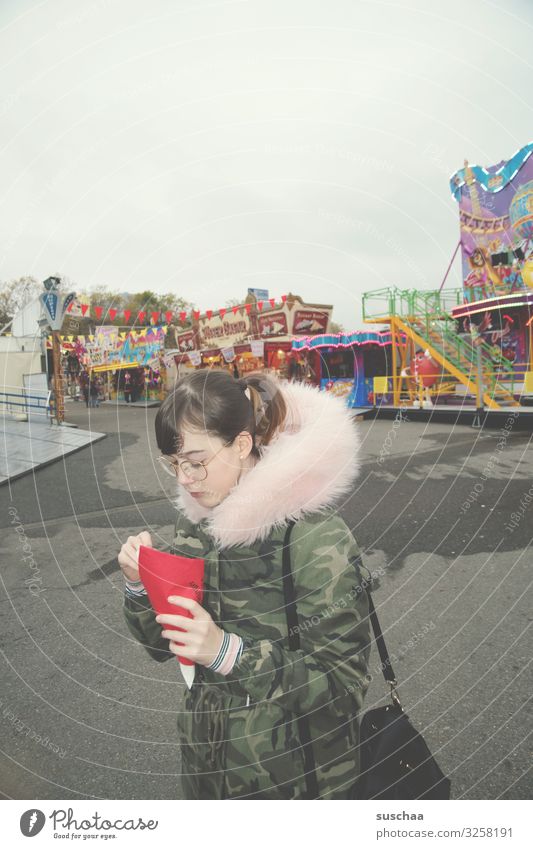 girl with bag of fries at the funfair Fairs & Carnivals booths Loud Multicoloured Crazy Gray Dreary Joy no fun Reluctance Converse Death Deserted Empty Gloomy
