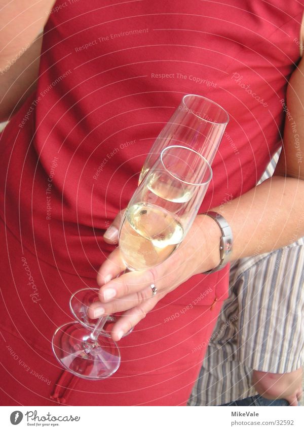 Another champagne? Sparkling wine Glass Woman Hand Nutrition Alcoholic drinks Party To pop the corks Party mood Party guest Party goer 2 Red Detail